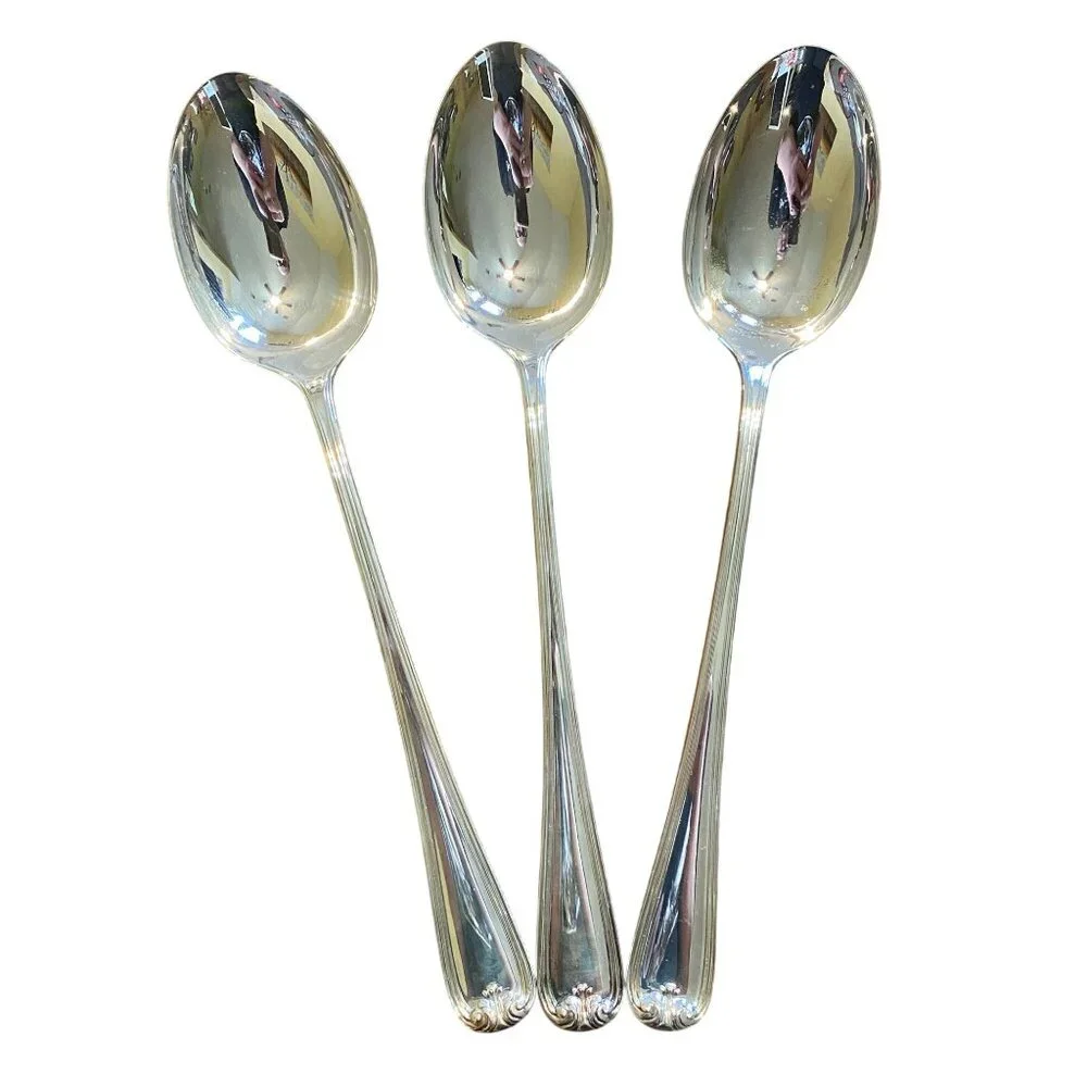 Gorham Heritage serving spoons 13